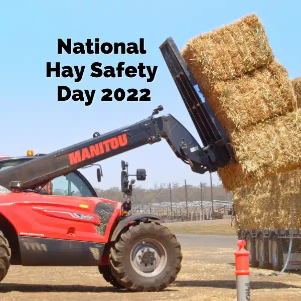 Loading hay bales on truck Hay Safety Day 2022 Feed Central